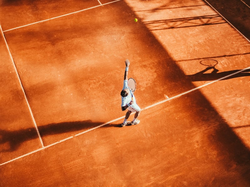 The Man Playing Tennis