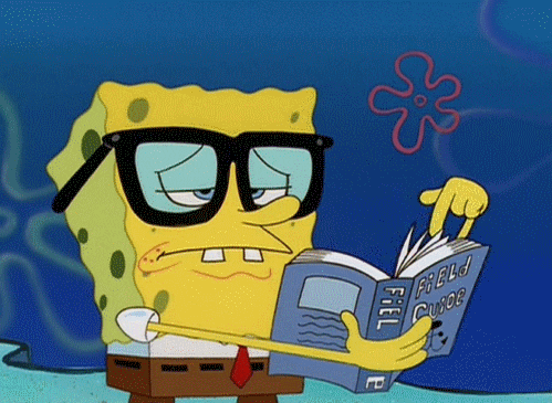 Spongebob wearing glassesand flipping through pages of a book.